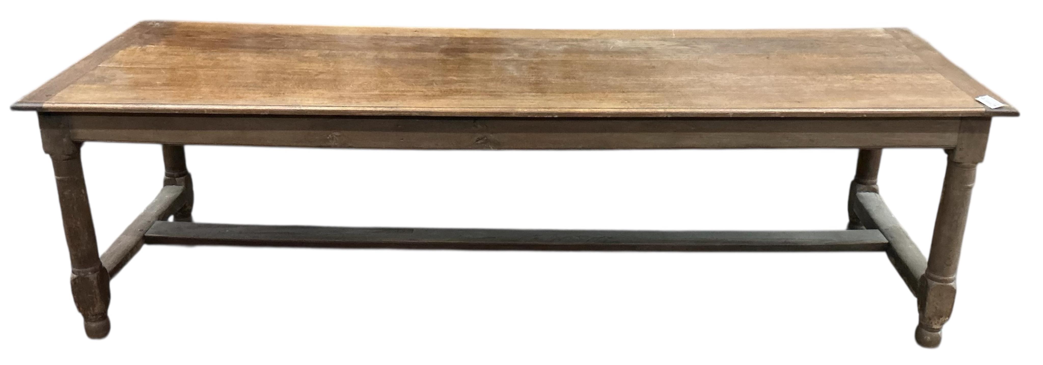 A late 19th century French oak rectangular refectory table, width 258cm, depth 88cm, height 75cm
